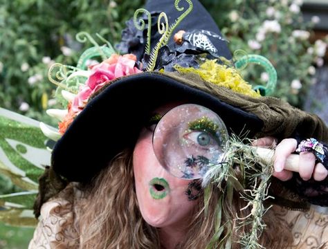 Gardner Village Witches - Witch with a magnifying glass 