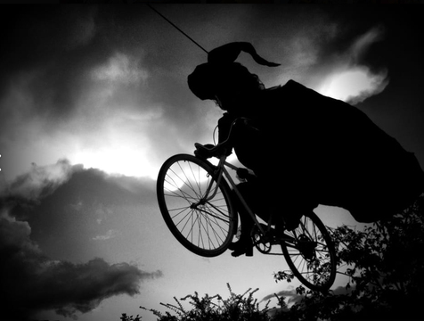 Gardner Village Witch Displays - biking witch display 