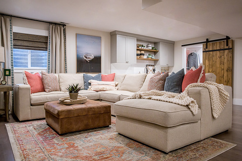 Down to Earth Projects | Castlefield Lane - Large upholsterd sectional with leather ottoman 