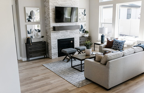 Down to Earth Projects | Jalais Lane - Living Room sectional fire place artwork 