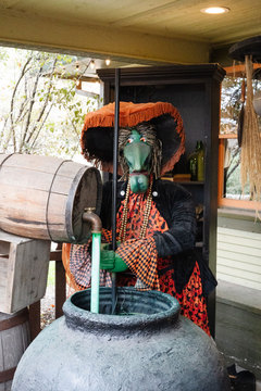 Gardner Village Witch Displays - witch stirring her cauldron 