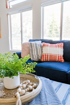 Down to Earth Projects | Draper Residence - blue sofa with coffee table  