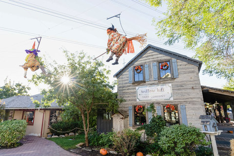 Gardner Village Witch Displays - flying witches on a broom race 