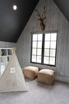 Down to Earth Projects | Kaysville Residence - play room with ottomans and teepee 