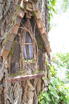 Woodland Fairy Festival - woodland fairy house and door in a tree 