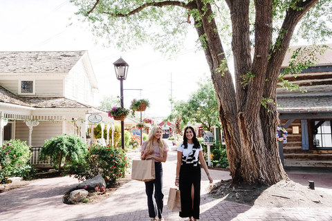 Friends Shopping at Gardner Village - two friends shopping along the main path 