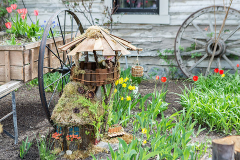 Woodland Fairy Festival - fairy house by old handcart wagon 