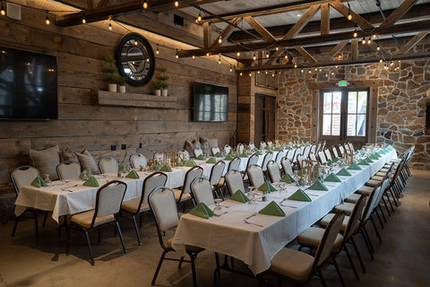 The Wheel Room located in Archibald's Restaurant  - two long tables at archibalds wheel room event venue 