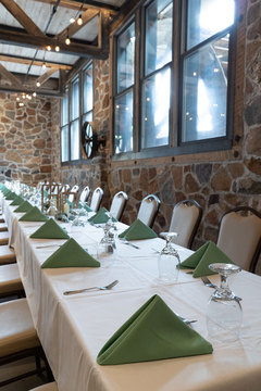 The Wheel Room located in Archibald's Restaurant  - close up photo of table set for an event in the wheel room 