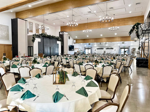 Christmas Party at The Gathering Place - christmas party tables set for a holiday party at the gathering place 