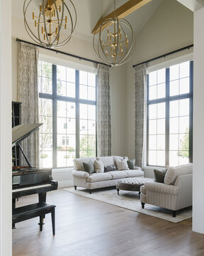 Down to Earth Projects | Utah Valley Parade at The Legacy at Meadow Ridge - front sitting room with grand piano 