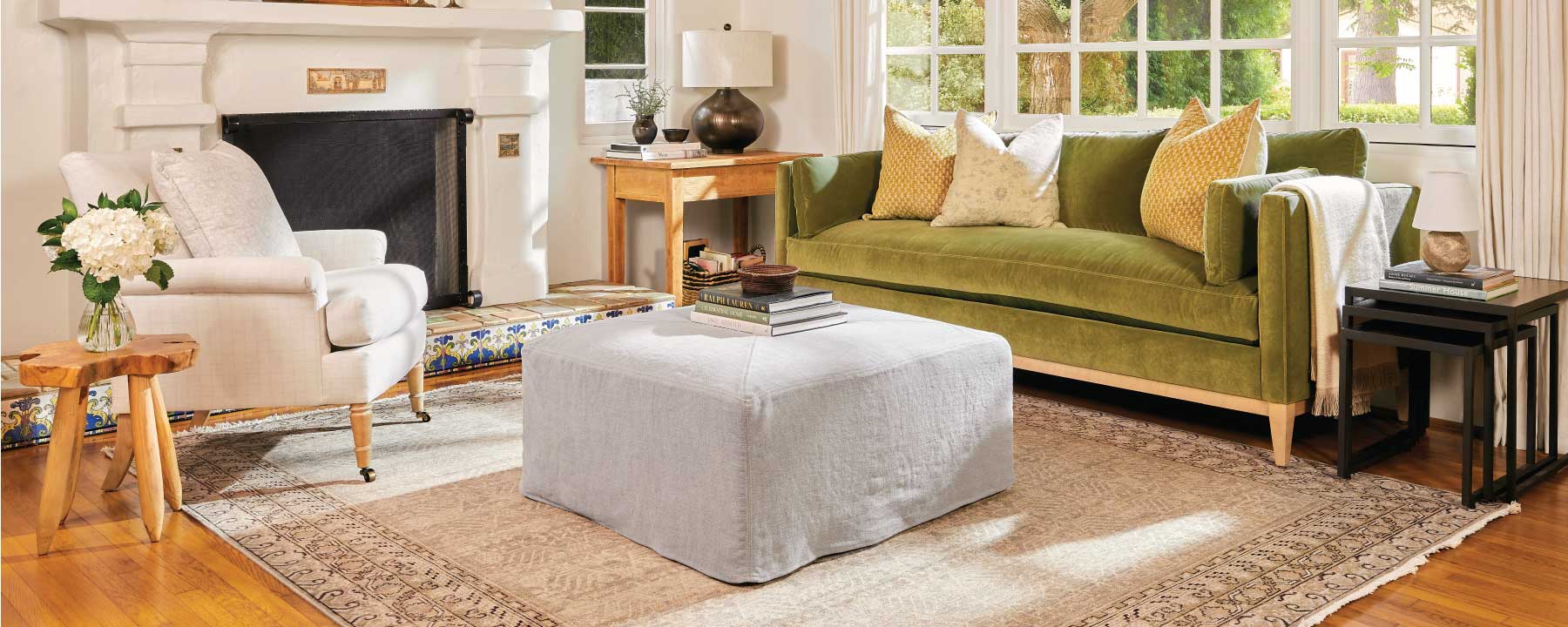 down to earth living room with green sofa and furniture